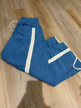 Blue Track Pants with White Side Stripes